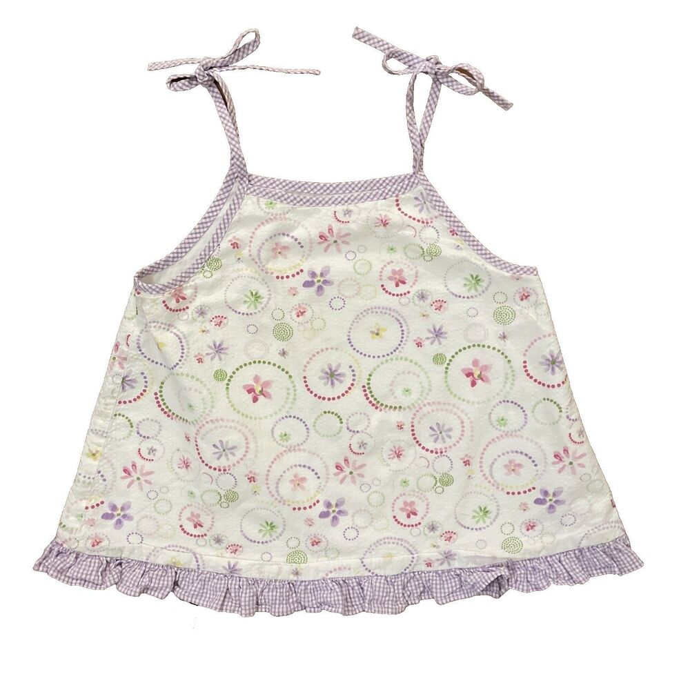 Adorable white pullover apron top by Hollywood Baby in a girls size 4. Features